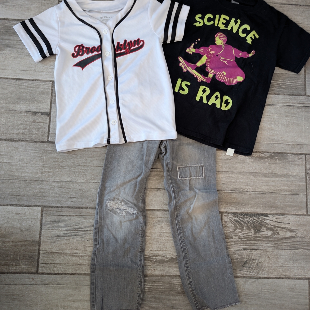 White and Black Baseball Shirt with Gray Jeans